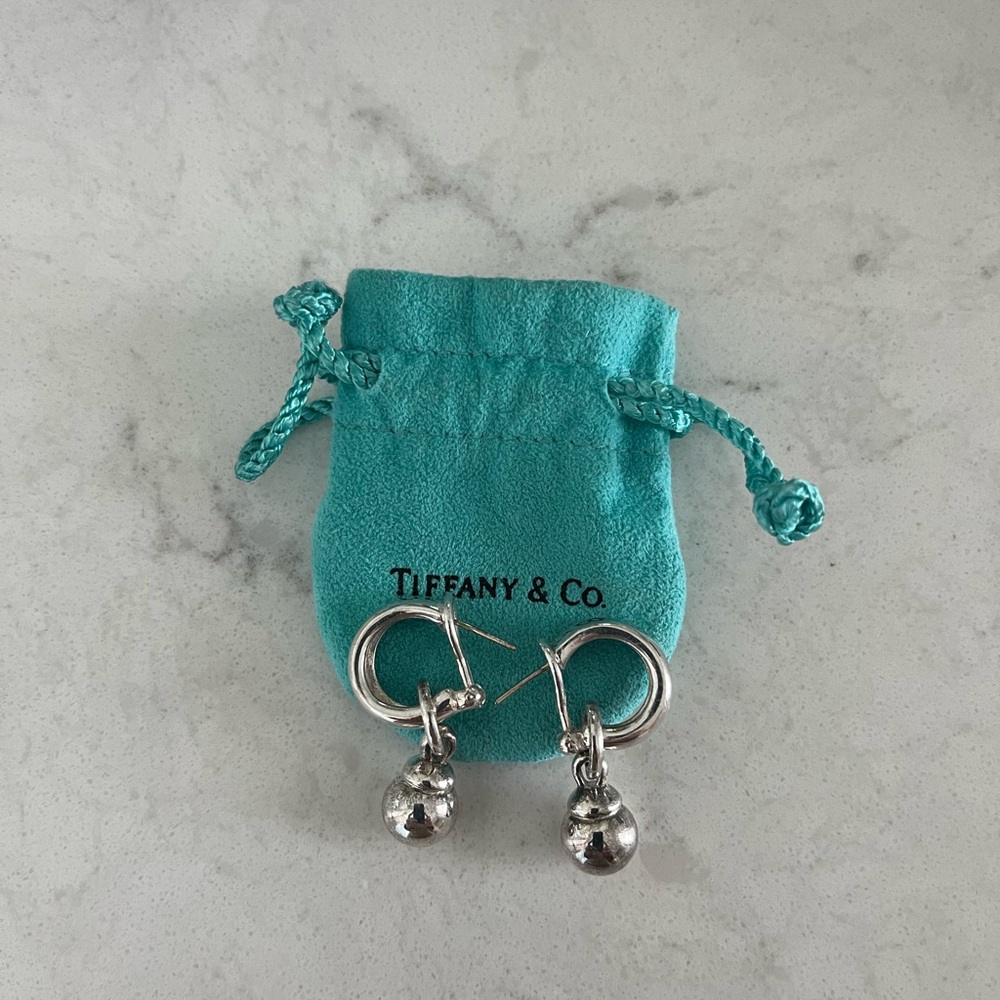 Tiffany & Co stamped Silver Ball earrings.  In pristine condition.